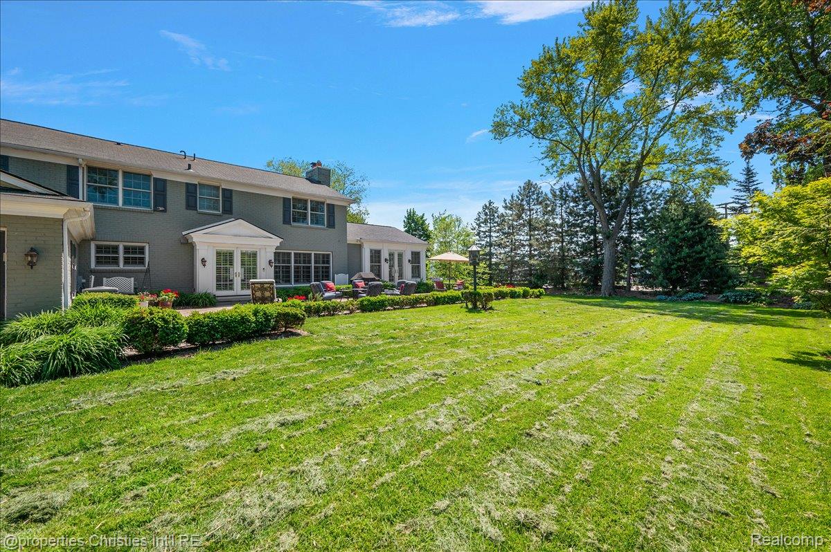 135 Clifton Road Bloomfield Hills, MI 48301 - Photo 77 of 77 Expansive green lawn with mature trees and perimeter landscaping
