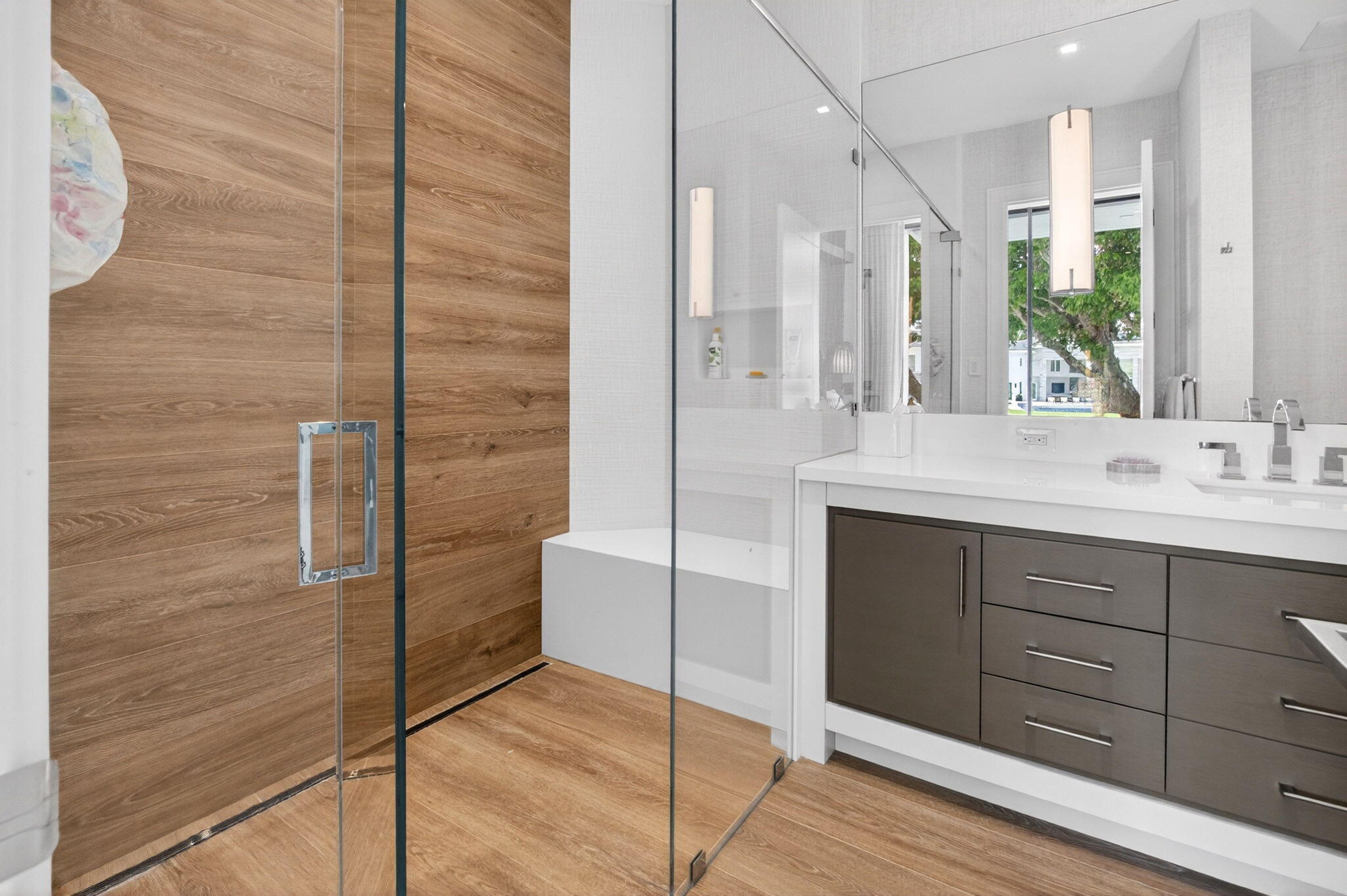 6960 Lake Estates Court Boca Raton, FL 33496 - Photo 26 of 58 a bathroom with a double vanity sink a mirror and a shower