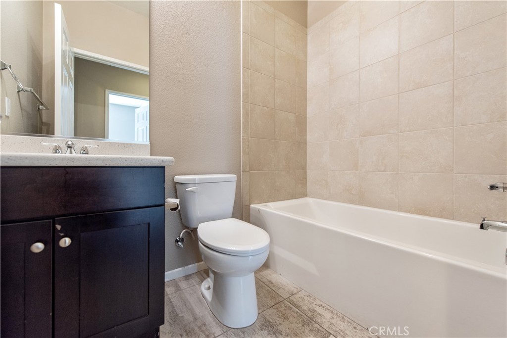 148 Compass Irvine, CA 92618 - Photo 5 of 15 a bathroom with a sink and a mirror