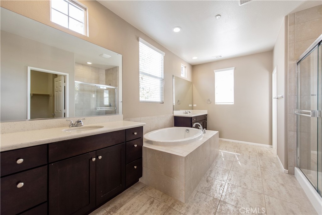 148 Compass Irvine, CA 92618 - Photo 9 of 15 a spacious bathroom with a double vanity sink mirror and