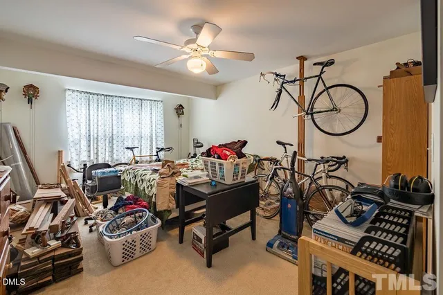 a bathroom with a sink toilet and mirror