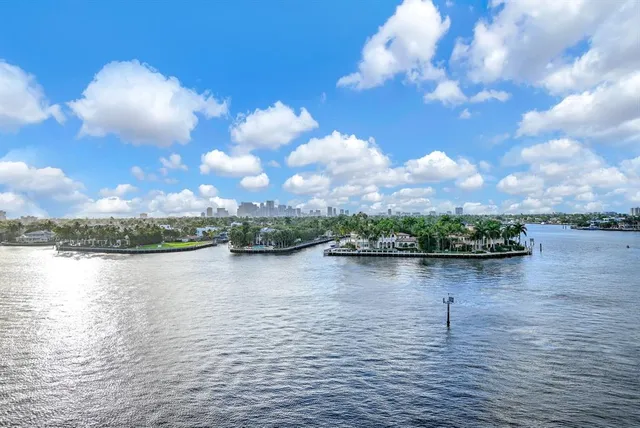 a large bathroom with a granite countertop sink mirror and a bathtub