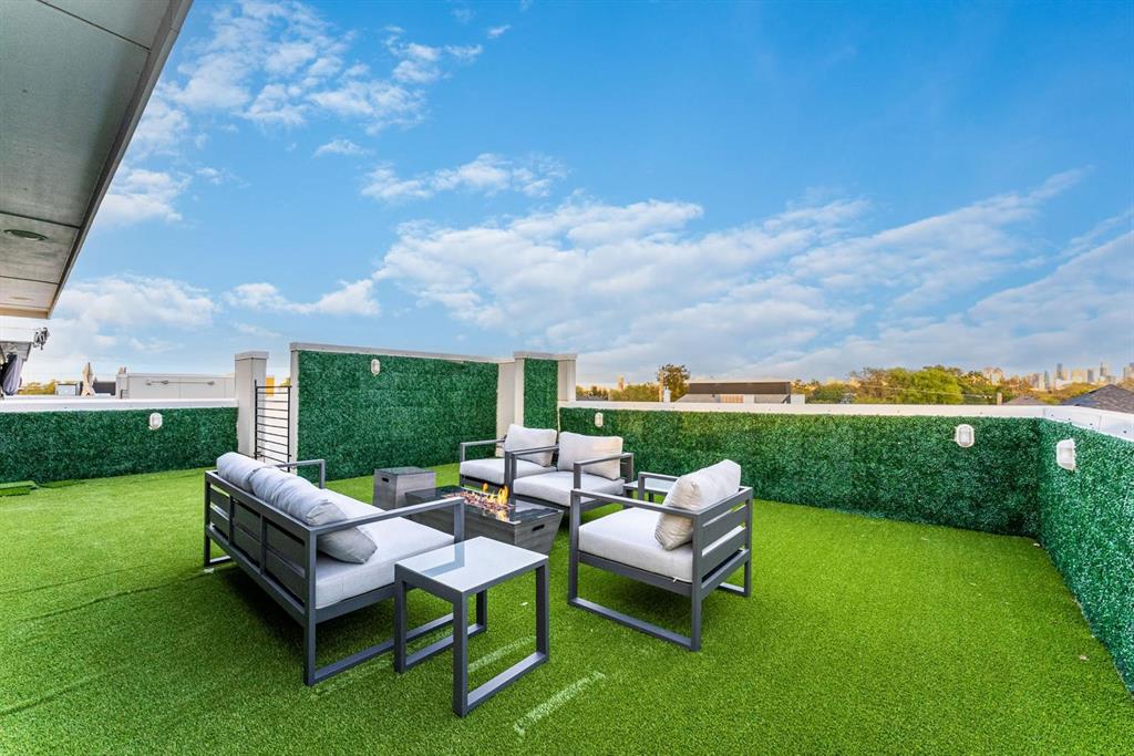 4013 Ivanhoe Lane Dallas, TX 75212 - Photo 28 of 38 View of yard with an outdoor hangout area