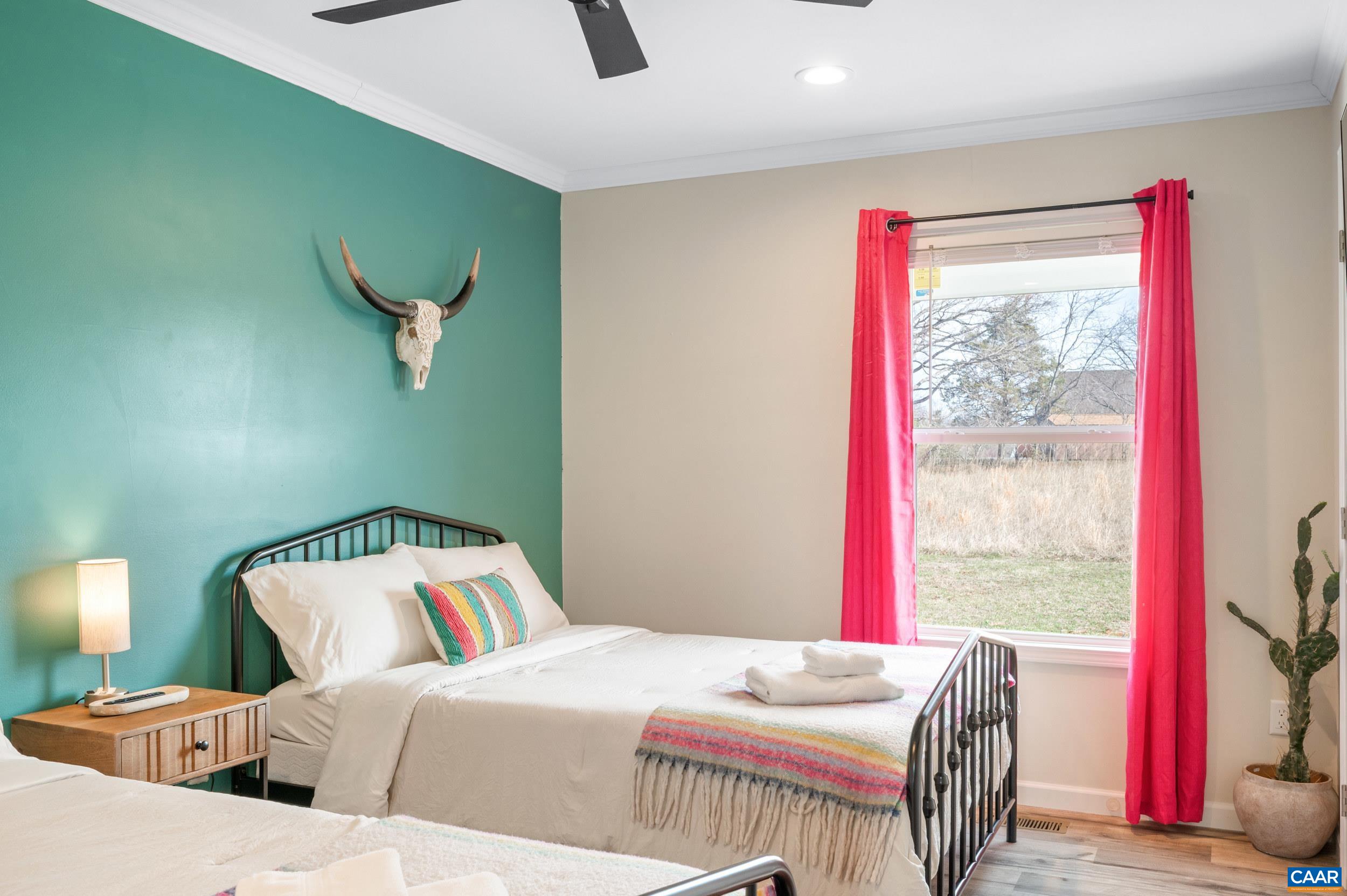 1600 Rock Spring Road Shipman, VA 22971 - Photo 33 of 74 a bedroom with a bed and a window