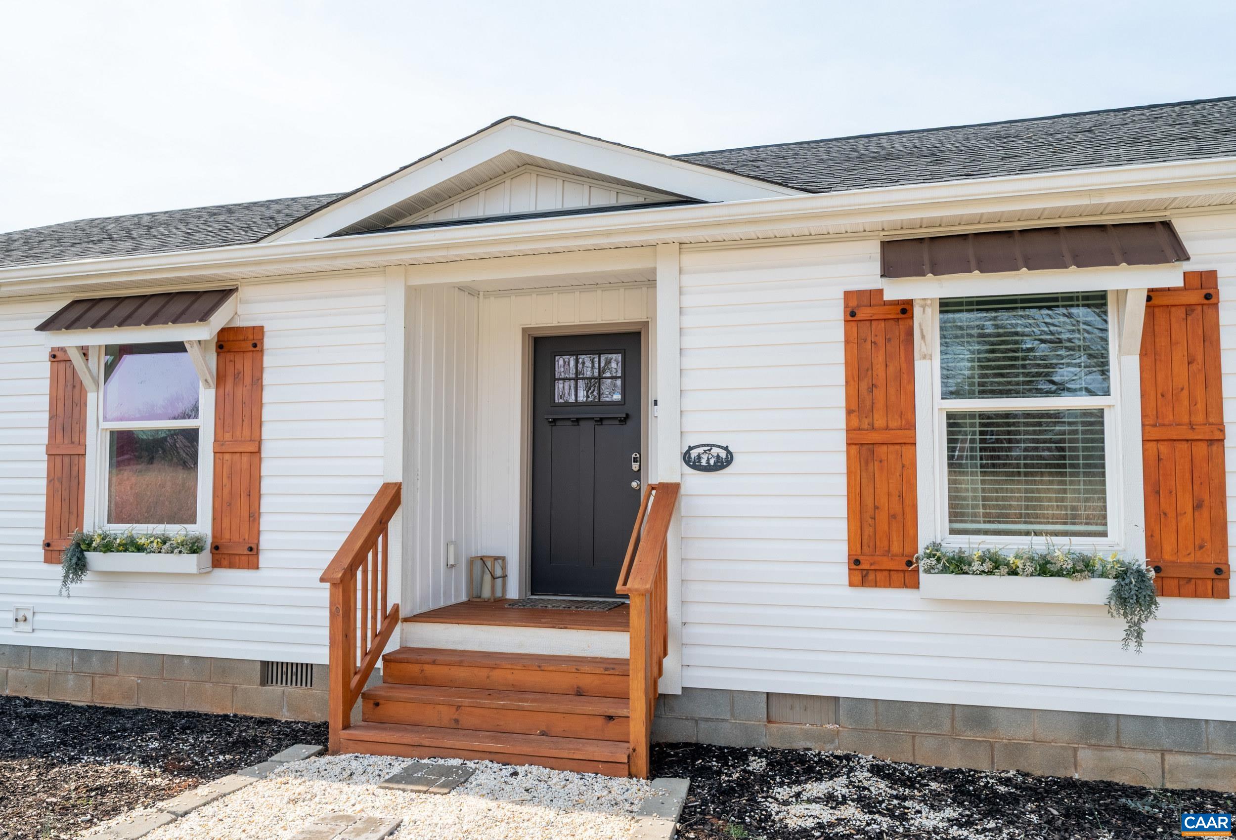 1600 Rock Spring Road Shipman, VA 22971 - Photo 49 of 74 a front view of a house with a porch