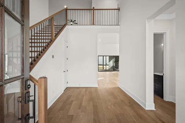 a view of entryway with wooden floor