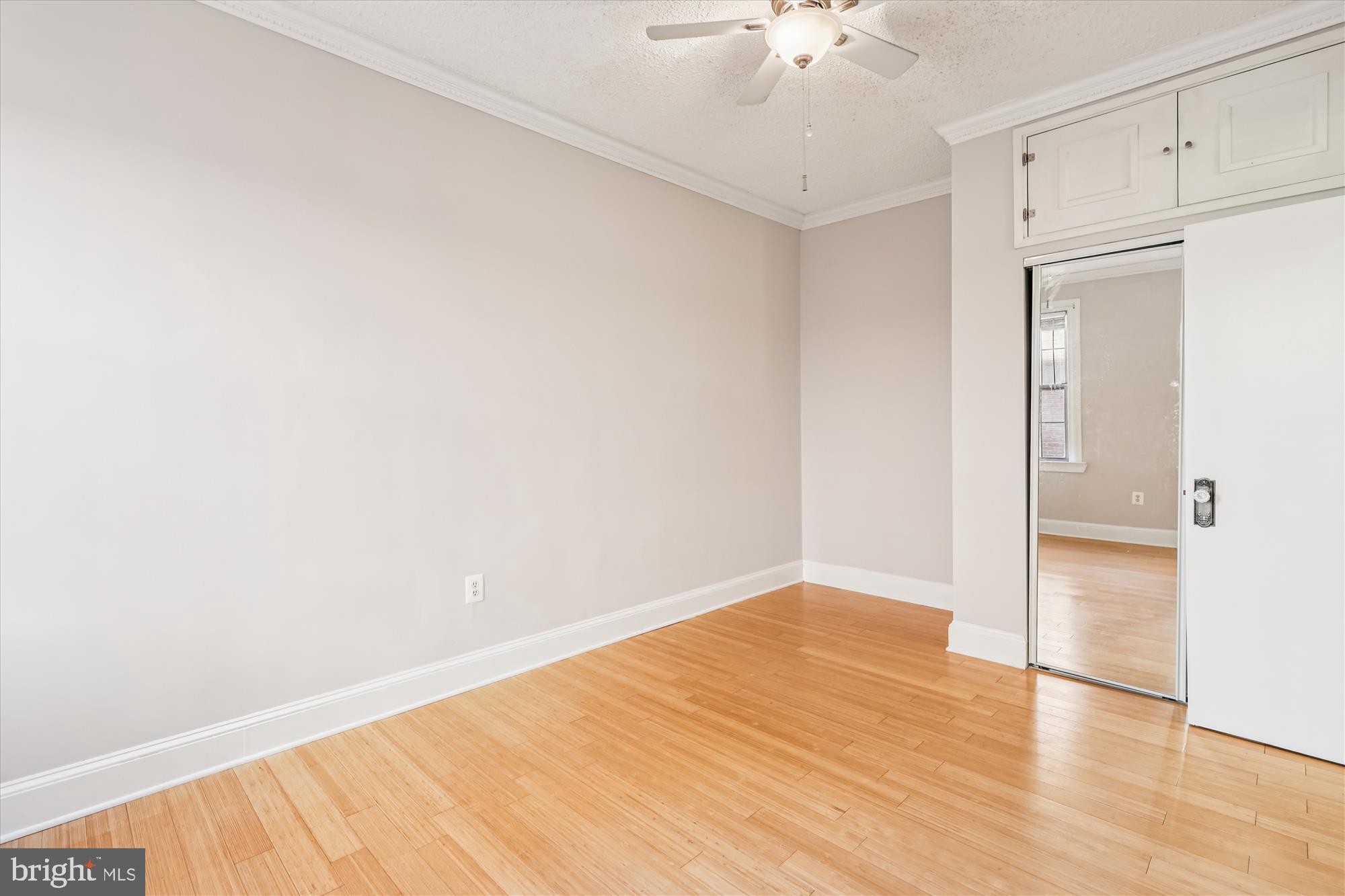 1401 Columbia Road Northwest, Unit 209 Washington, DC 20009 - Photo 15 of 34 wooden floor in an empty room