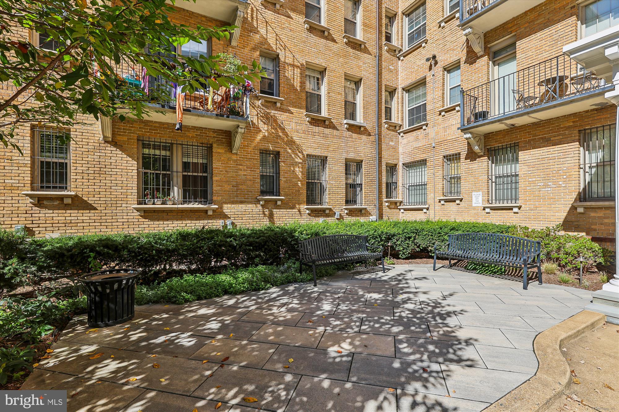 1401 Columbia Road Northwest, Unit 209 Washington, DC 20009 - Photo 34 of 34 a view of a building with a yard