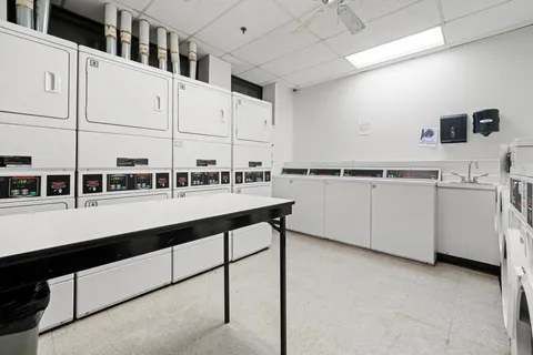 a view of outdoor space with garden and trees