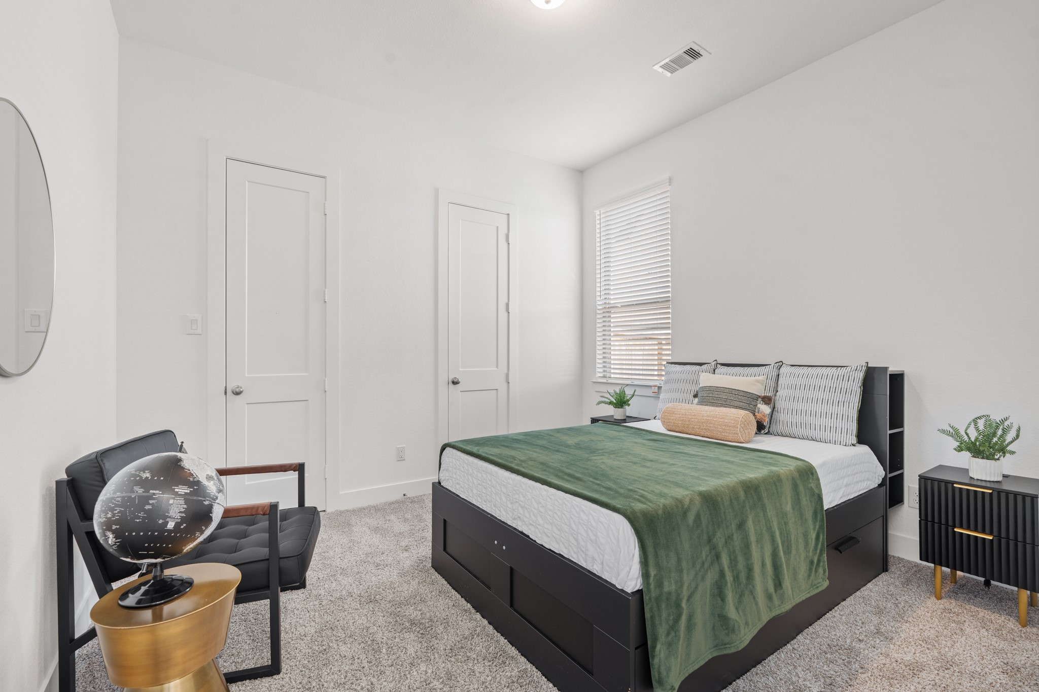 7403 Hanover Lane Katy, TX 77493 - Photo 26 of 46 Located just off the game room is the first secondary bedroom with its own separate entrance and a private ensuite bathroom, it's ideal for guests or as an in-law suite.