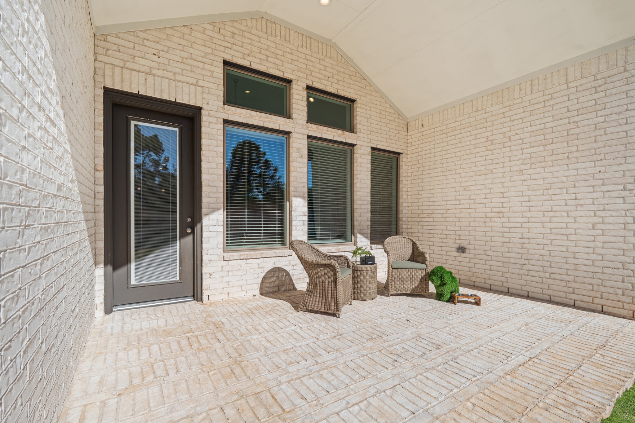 7403 Hanover Lane Katy, TX 77493 - Photo 32 of 46 Step outside to enjoy the expansive backyard, complete with a large covered patio — the perfect setup for outdoor dining, lounging, or weekend barbecues. It connects to the main living area for easy entertaining!