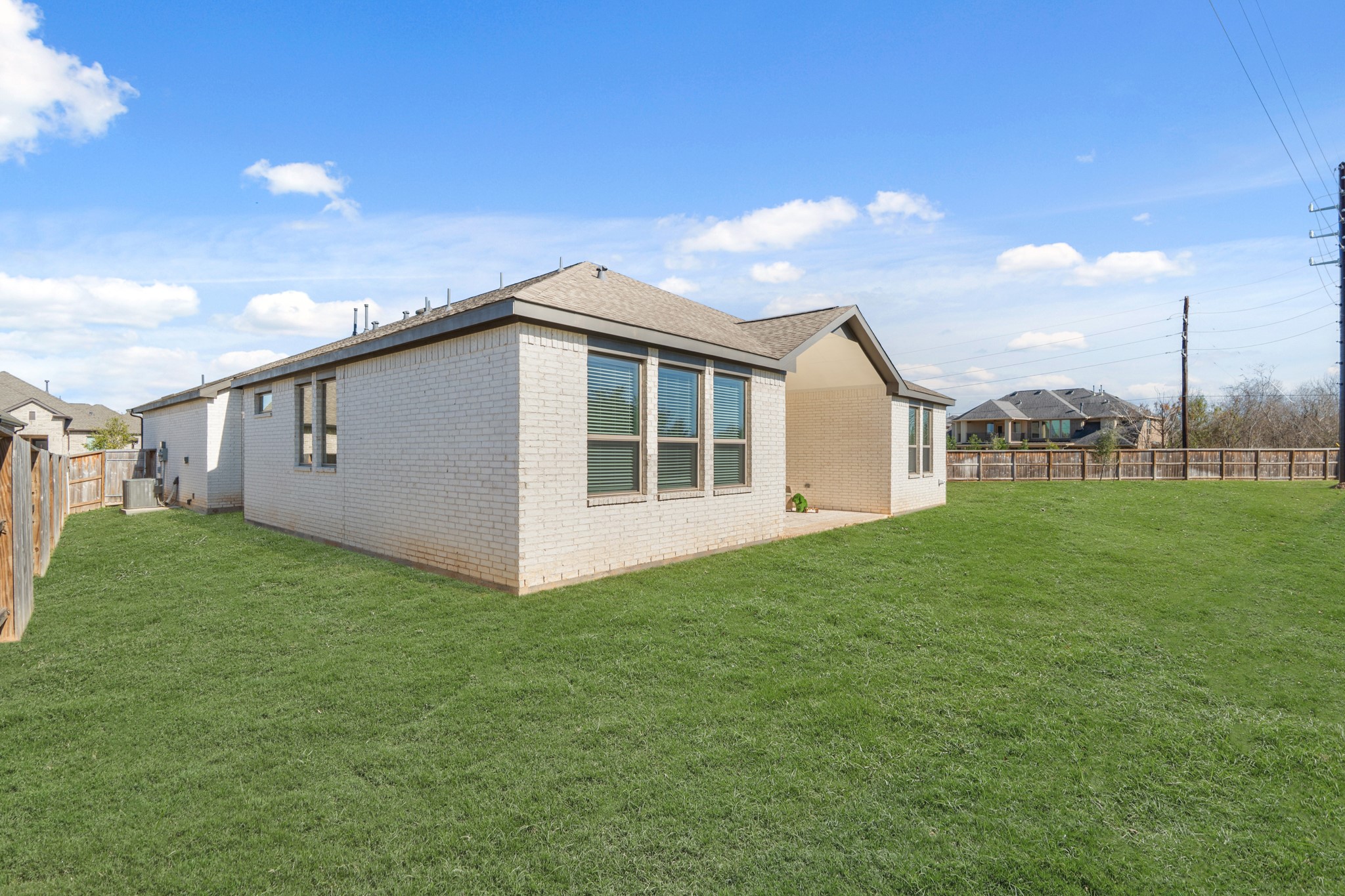 7403 Hanover Lane Katy, TX 77493 - Photo 35 of 46 Outside, enjoy the privacy of an oversized backyard with no rear neighbors, complete with a large covered patio!
