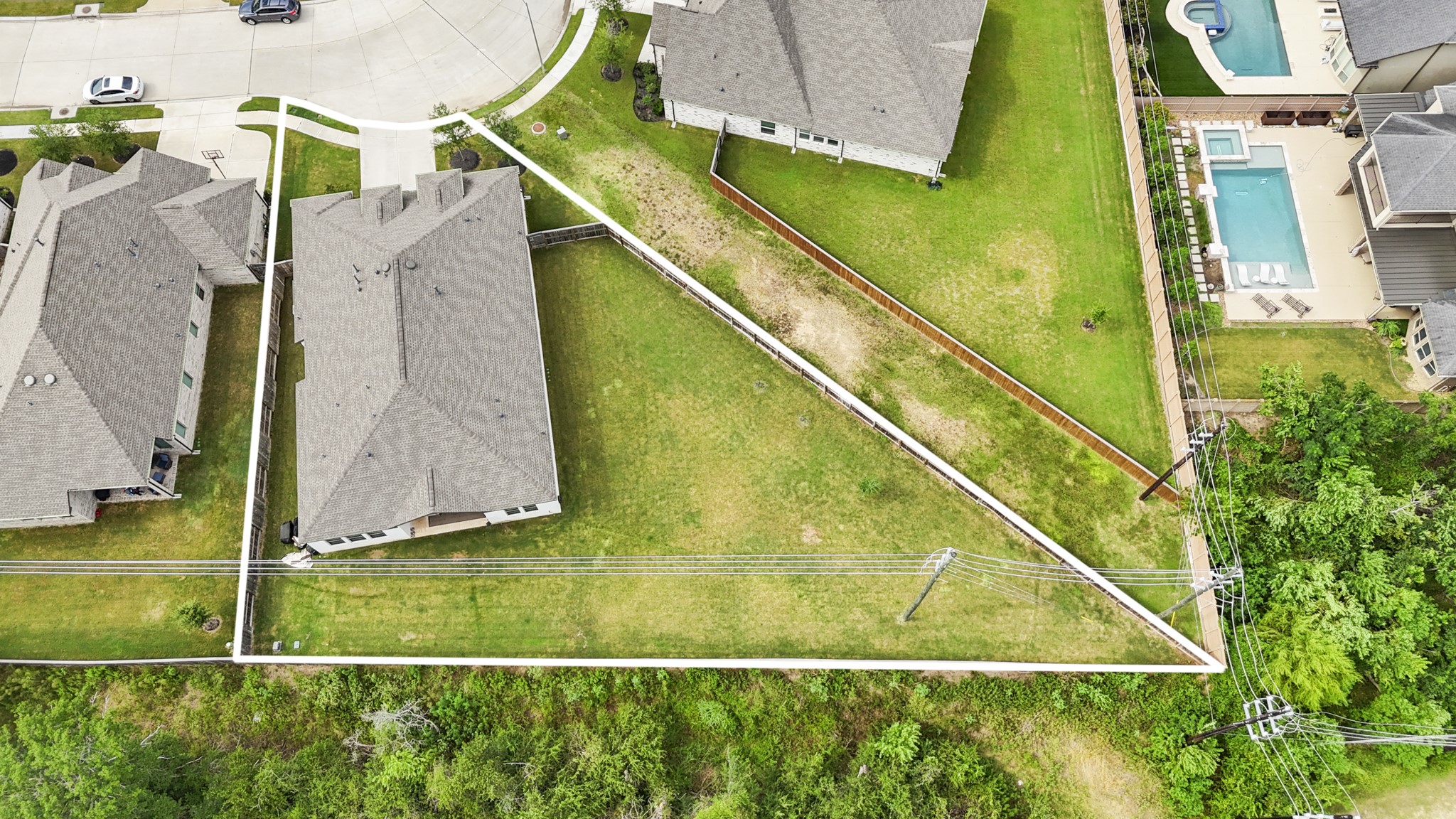 7403 Hanover Lane Katy, TX 77493 - Photo 36 of 46 The aerial view showcases the oversized pool sized lot with no back neighbors! This property is the perfect canvas to create your ultimate outdoor retreat!