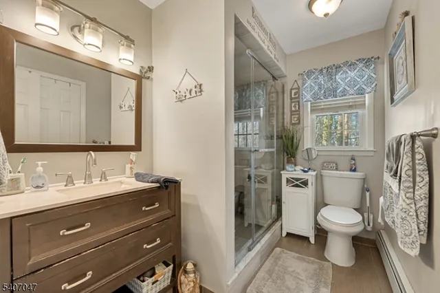 a view of a balcony with wooden floor and fence