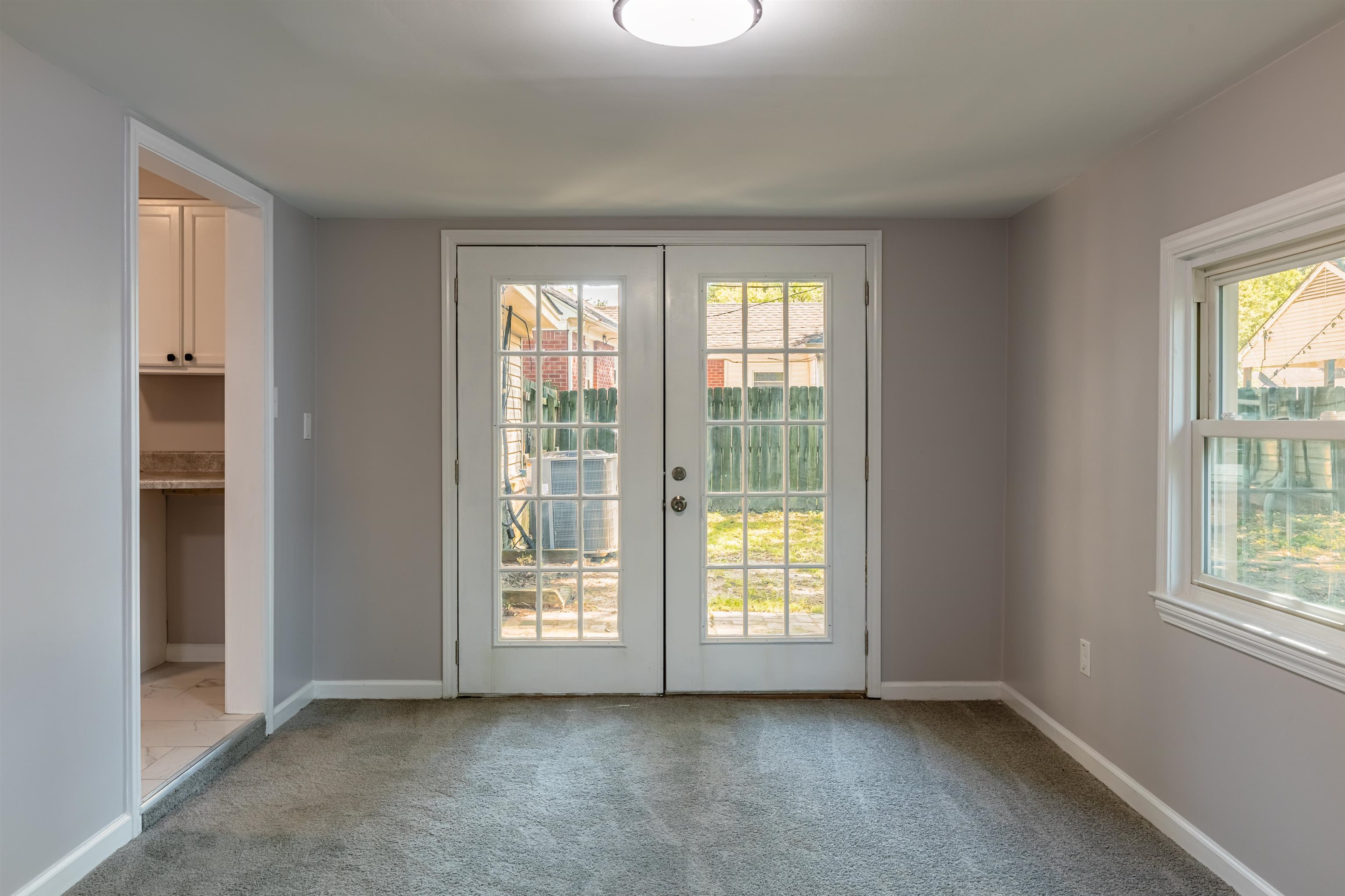 4400 Helene Road Memphis, TN 38117 - Photo 18 of 31 an empty room with windows