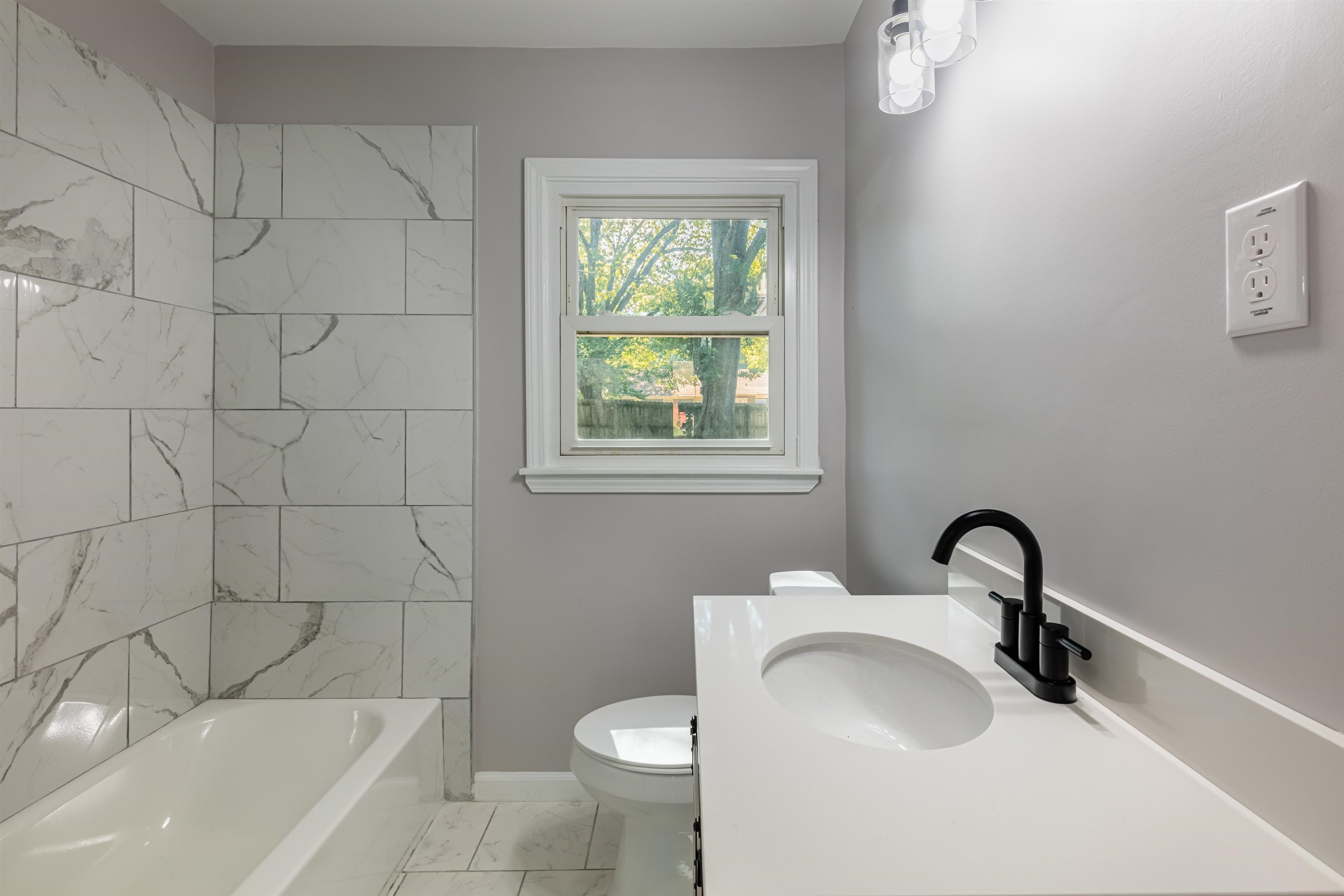 4400 Helene Road Memphis, TN 38117 - Photo 22 of 31 a bathroom with a sink and a bathtub