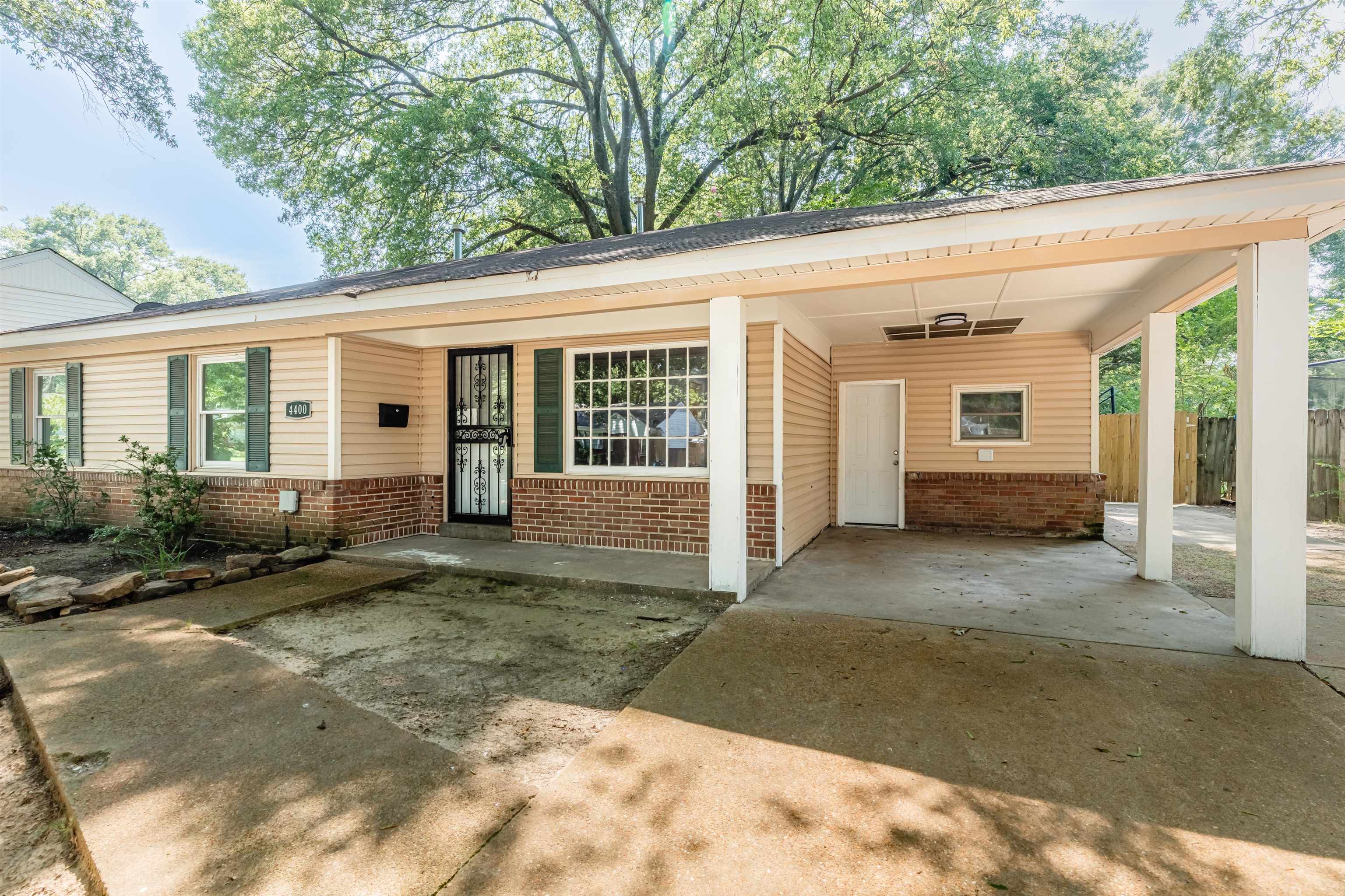 4400 Helene Road Memphis, TN 38117 - Photo 5 of 31 a view of a house with backyard and garden