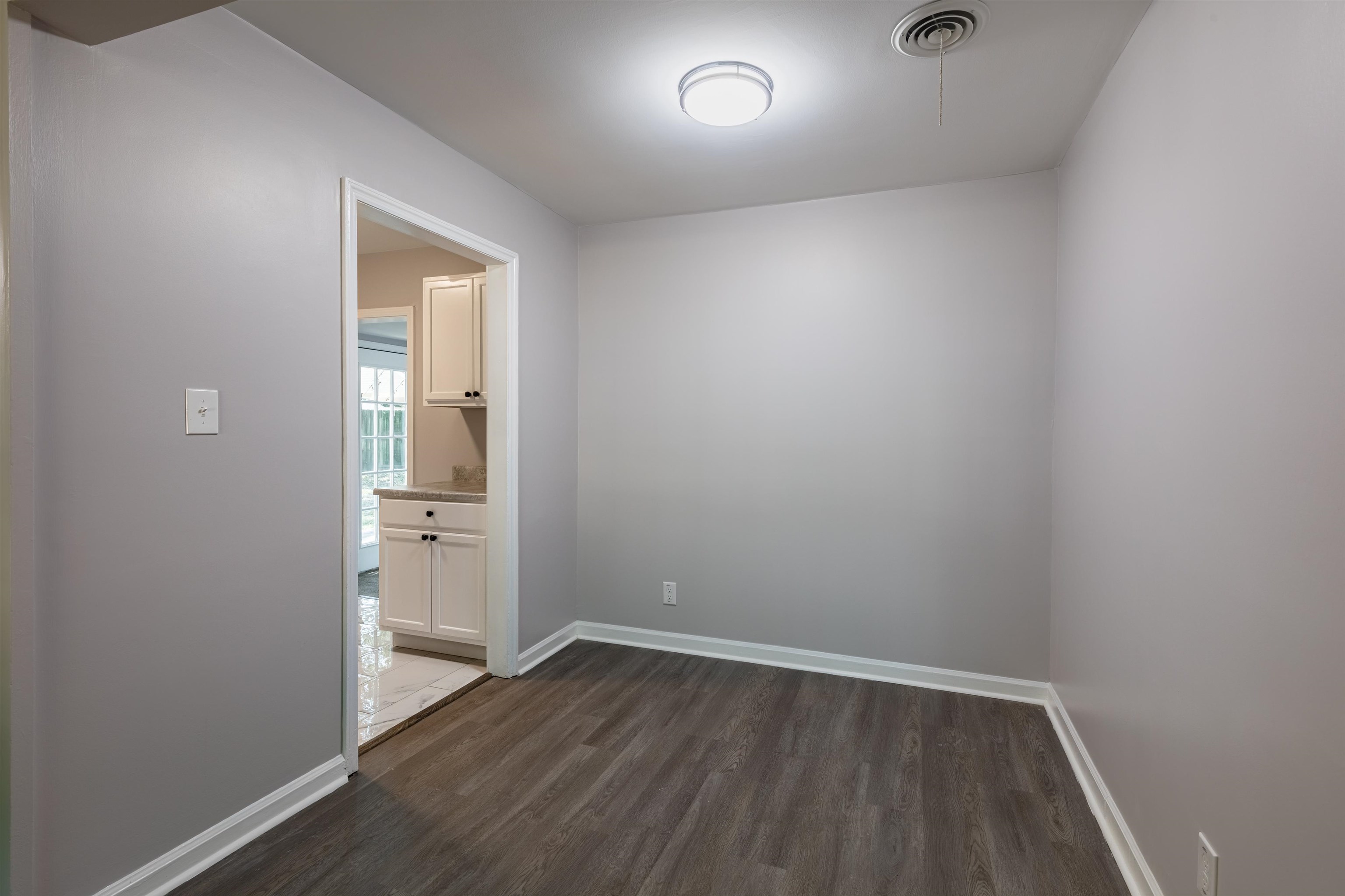 4400 Helene Road Memphis, TN 38117 - Photo 10 of 31 an empty room with wooden floor and closet