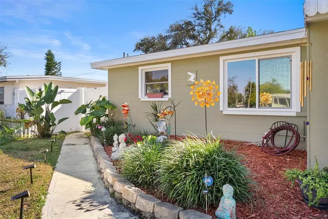 an aerial view of a city with lots of residential buildings