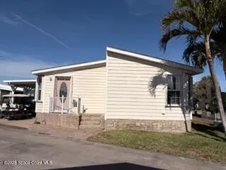 a view of a house with a patio
