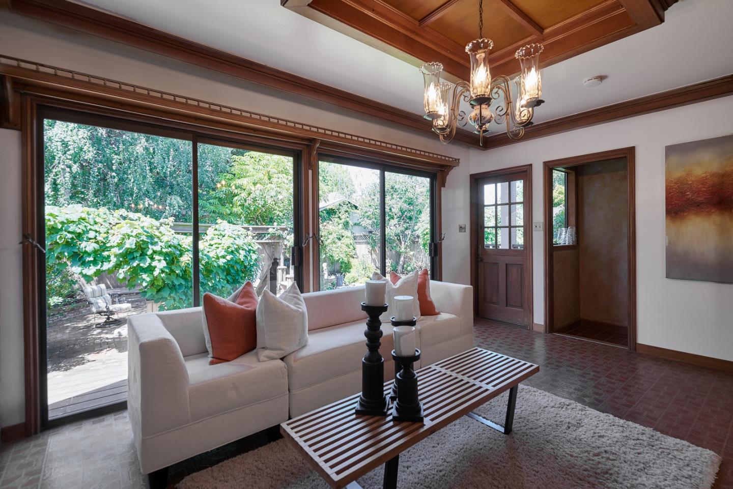17 Bancroft Road Burlingame, CA 94010 - Photo 12 of 25 a living room with furniture and a chandelier