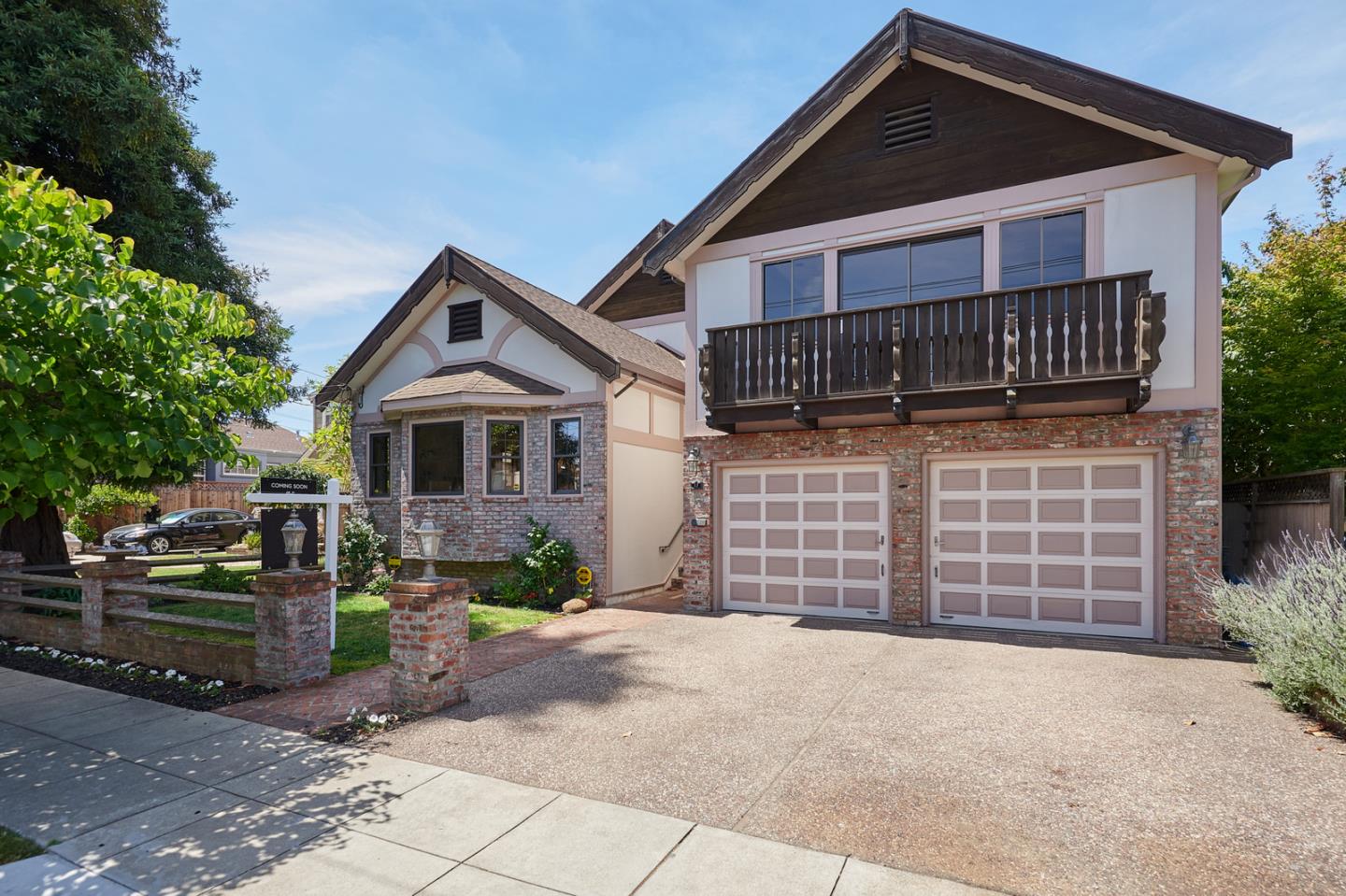 17 Bancroft Road Burlingame, CA 94010 - Photo 2 of 25 a front view of a house with a yard