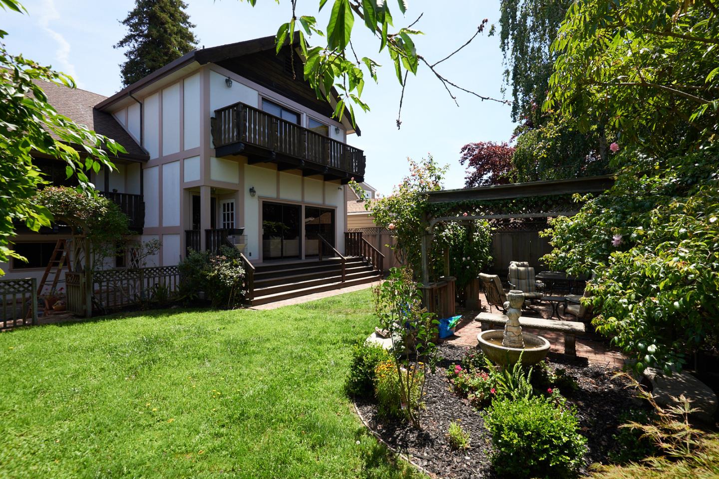 17 Bancroft Road Burlingame, CA 94010 - Photo 25 of 25 a view of a house with a yard and sitting area