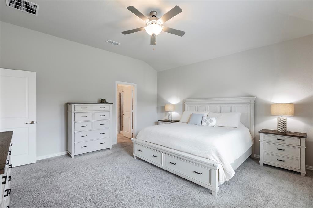 1504 Cobblestone Road Melissa, TX 75454 - Photo 18 of 39 Spacious bedroom with a calm, comfortable feel.