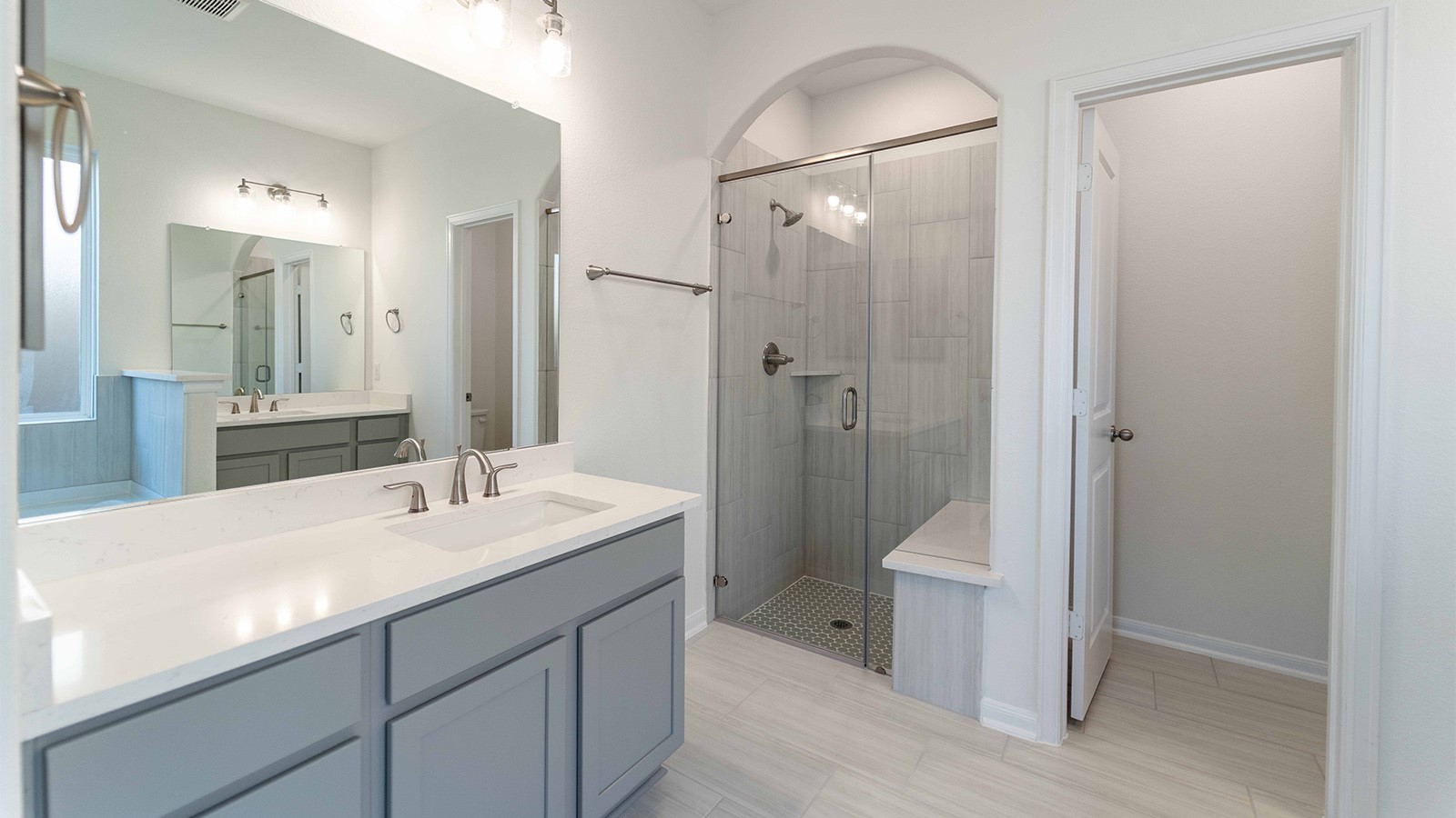 294 Rubber Tree Way Buda, TX 78610 - Photo 9 of 19 Bathroom with vanity and a shower stall