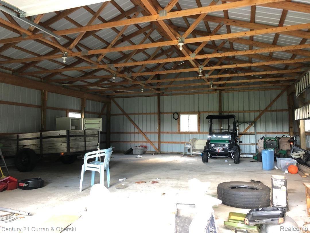 2150 Gavord Road Sterling, MI 48659 - Photo 24 of 29 pole barn inside messy.jpg