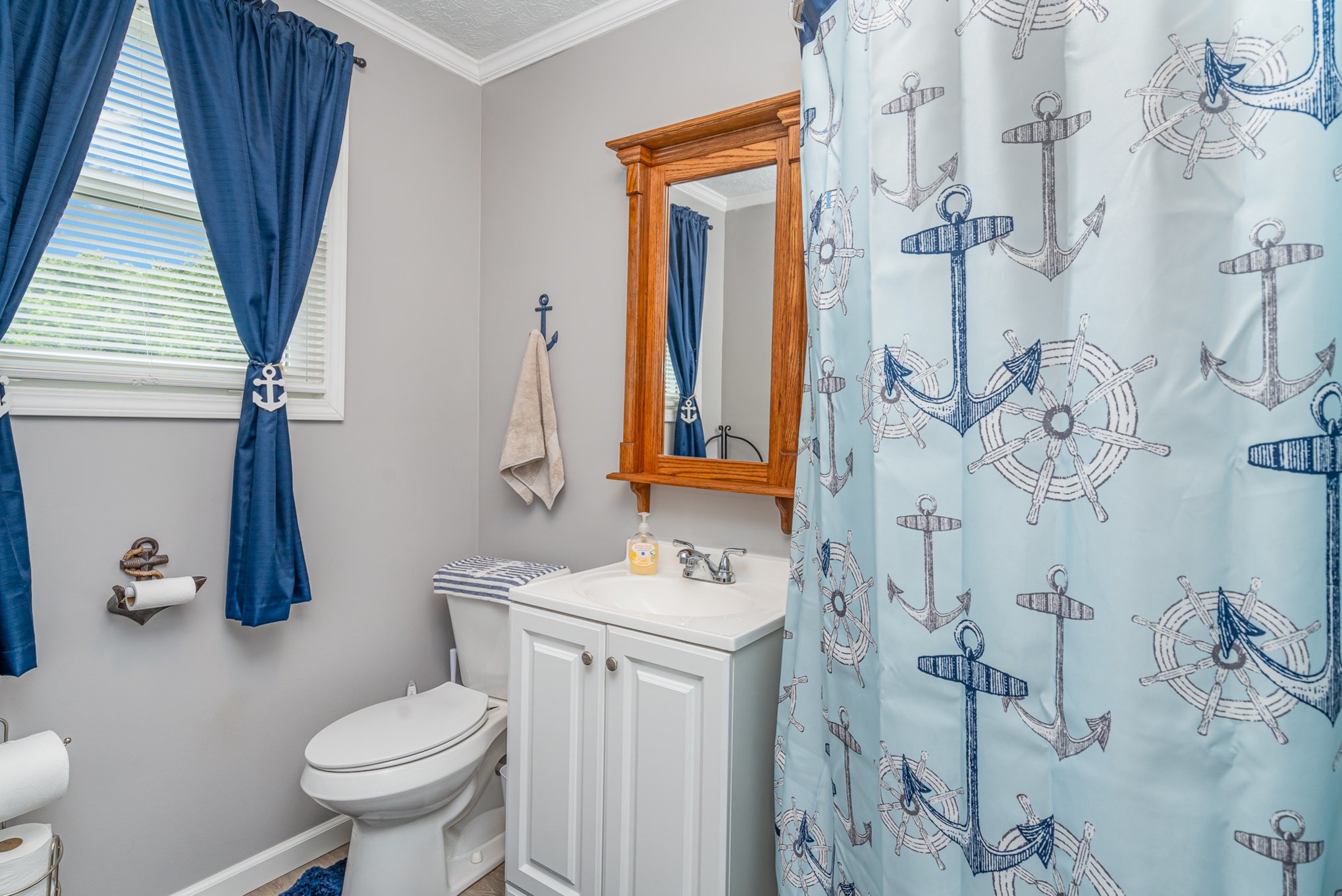 905 Nokes Road Lebanon, TN 37090 - Photo 23 of 30 a bathroom with a sink toilet and shower