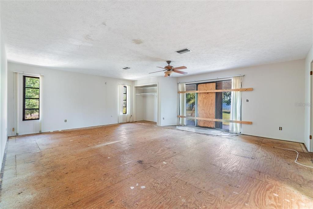 2620 Trent Road Palm Harbor, FL 34684 - Photo 11 of 21 a view of an empty room with a window