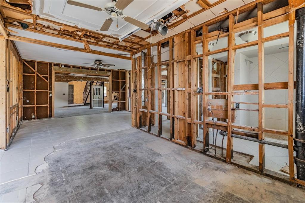 2620 Trent Road Palm Harbor, FL 34684 - Photo 5 of 21 a view of an empty room with wooden floor