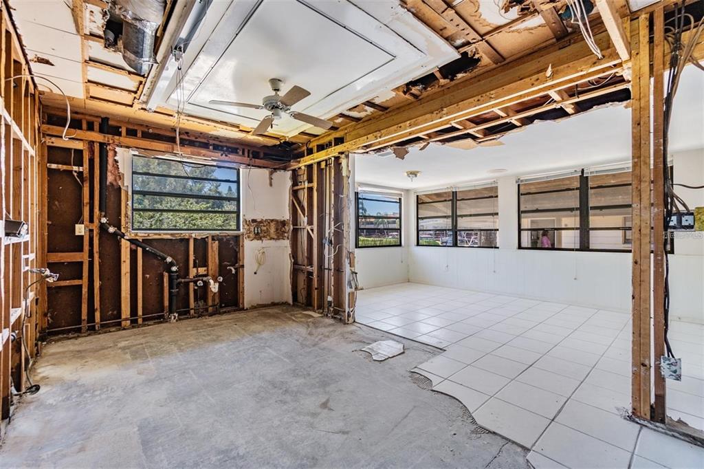 2620 Trent Road Palm Harbor, FL 34684 - Photo 7 of 21 a view of an empty room with wooden walls