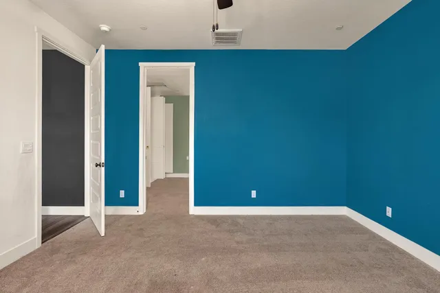 a kitchen with stainless steel appliances a stove sink and refrigerator
