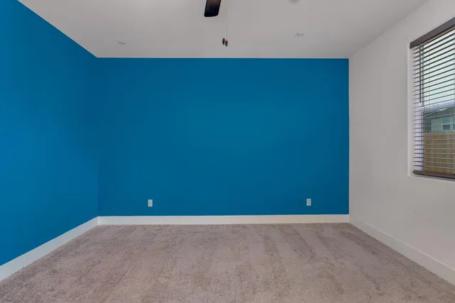 a kitchen with kitchen island a sink stainless steel appliances and cabinets