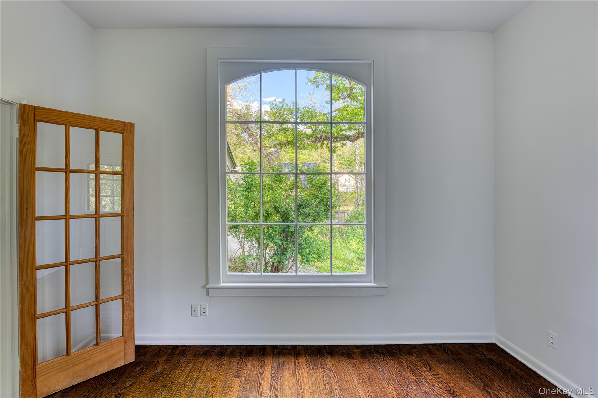 61 Indian Brook Road Garrison, NY 10524 - Photo 23 of 23 a view of a room with wooden floor and a window