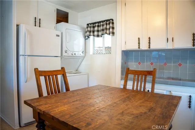 a bedroom with a bed and a table