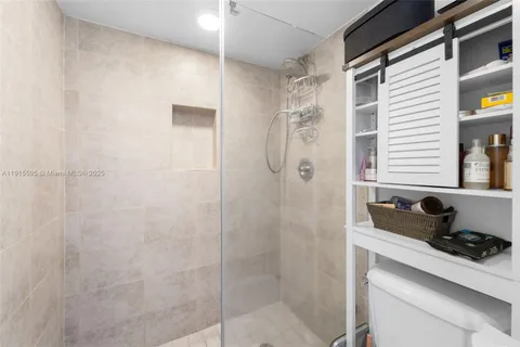 a bathroom with a sink and a shower