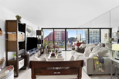 a view of a livingroom with furniture and window