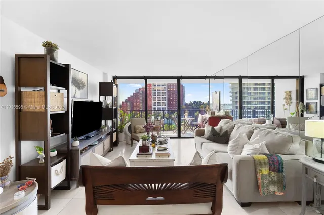 a view of a livingroom with furniture and window
