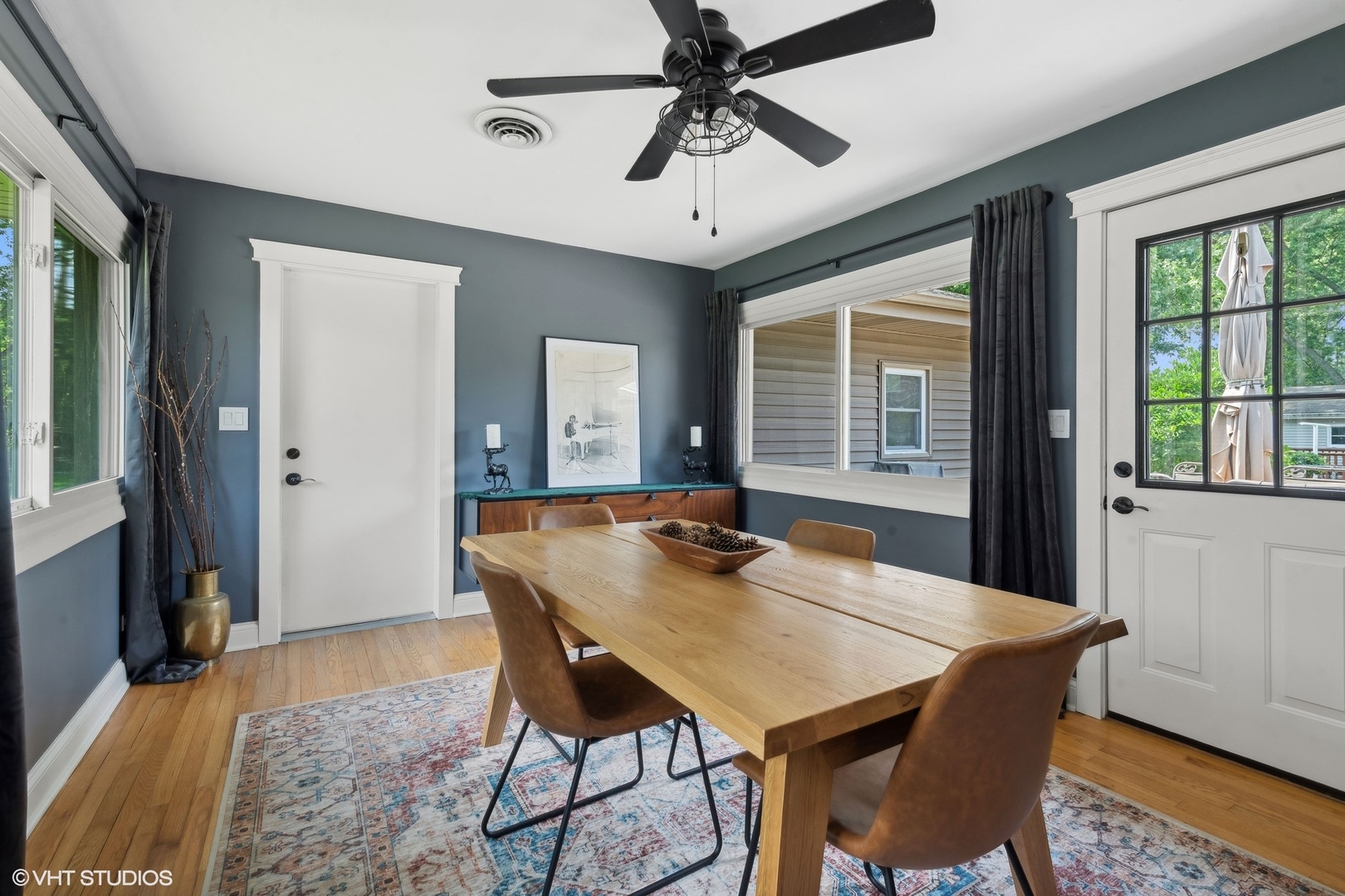 73 Golfview Road Lake Zurich, IL 60047 - Photo 12 of 34 a view of a dining room with furniture window and wooden floor