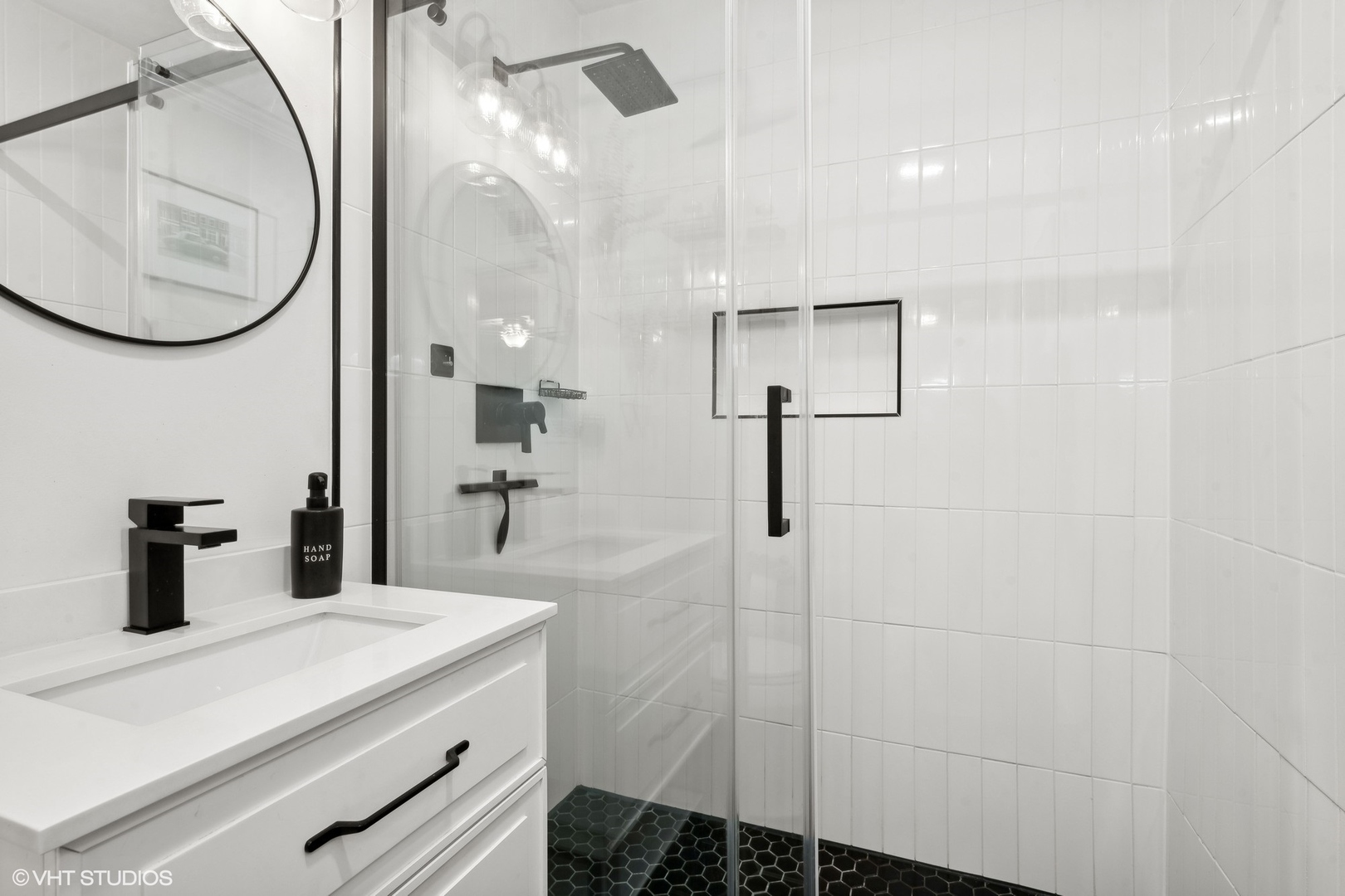 73 Golfview Road Lake Zurich, IL 60047 - Photo 18 of 34 a bathroom with a sink and a mirror