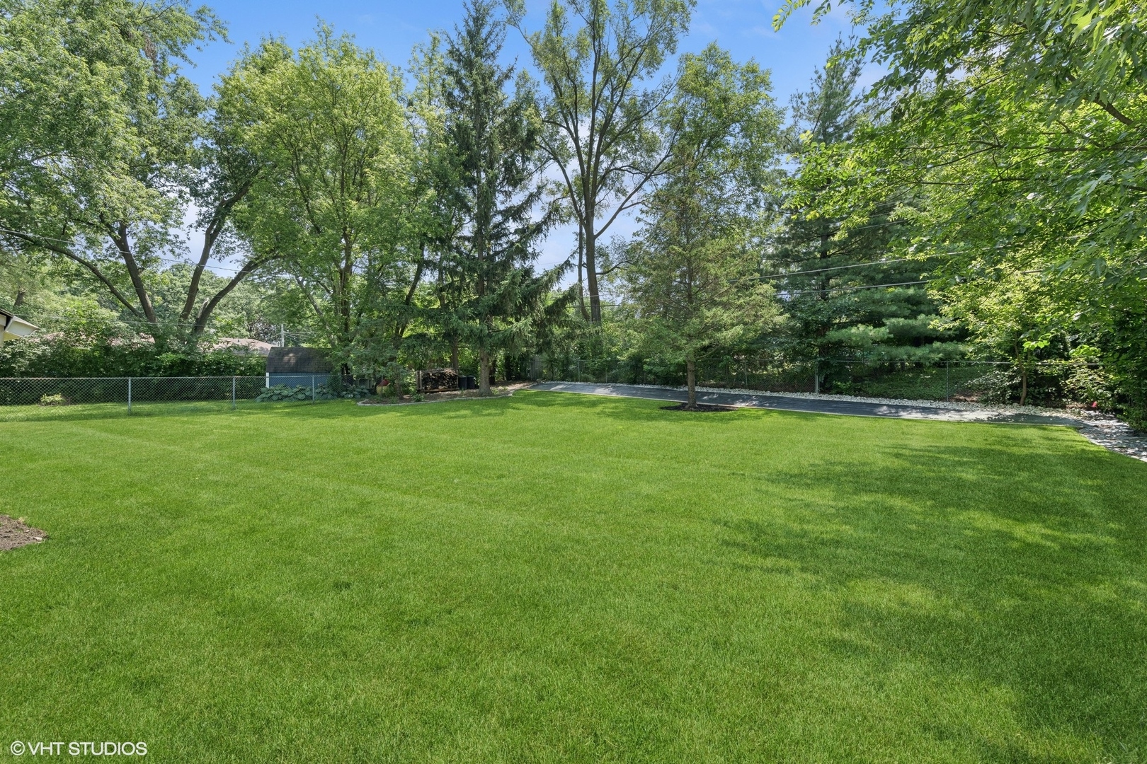 73 Golfview Road Lake Zurich, IL 60047 - Photo 26 of 34 a view of a grassy field with trees