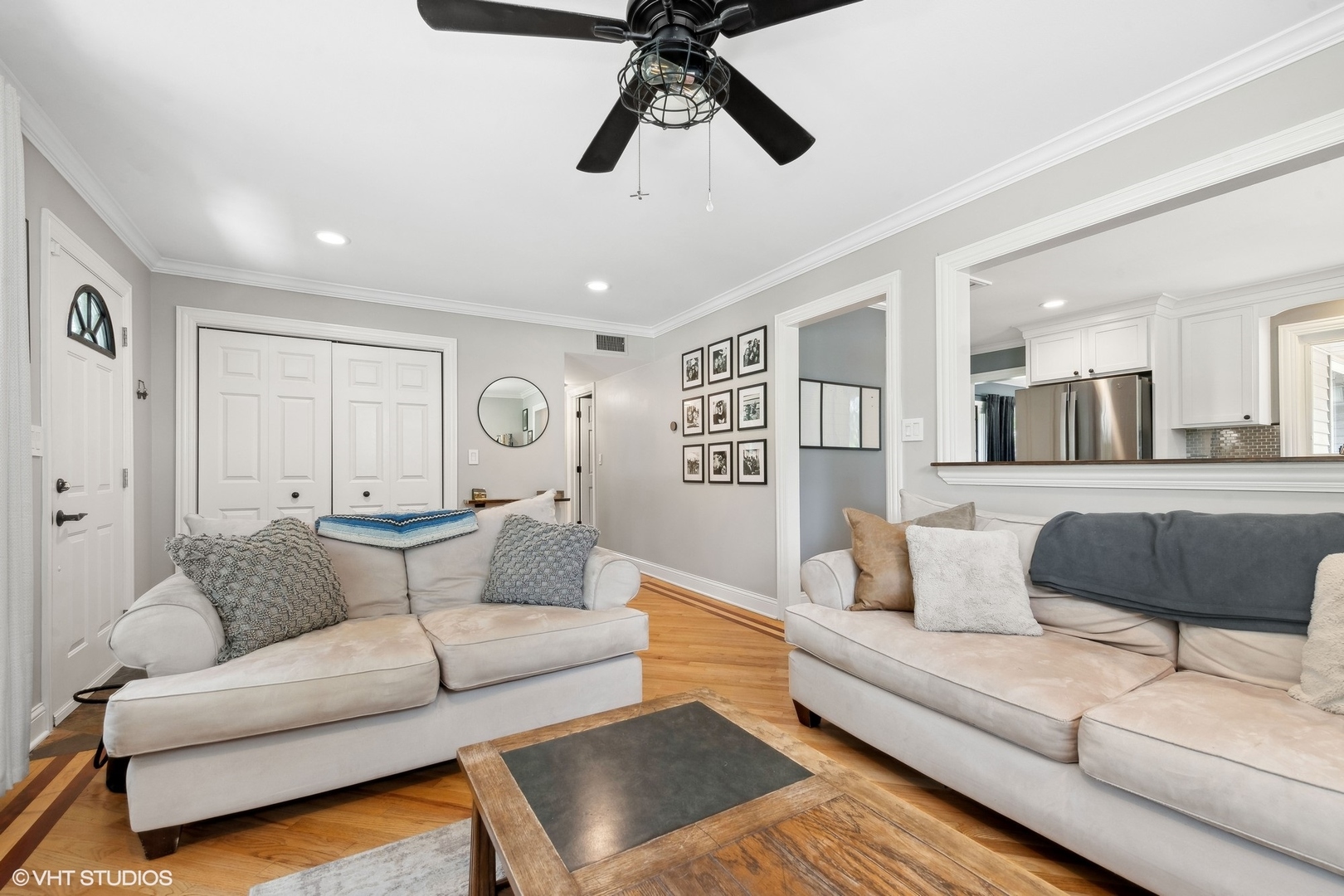 73 Golfview Road Lake Zurich, IL 60047 - Photo 5 of 34 a living room with furniture and a large window