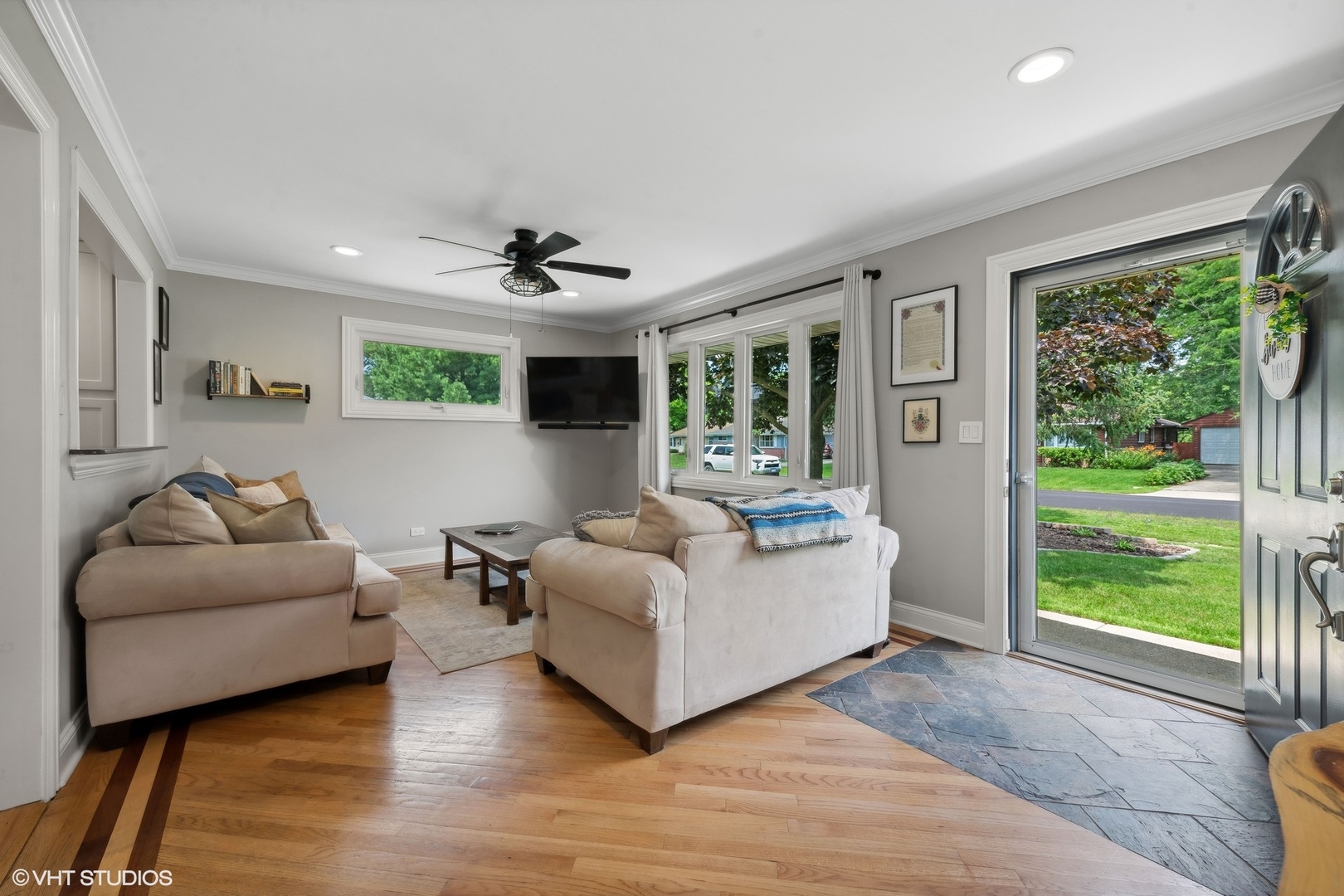 73 Golfview Road Lake Zurich, IL 60047 - Photo 6 of 34 a living room with furniture and a large window
