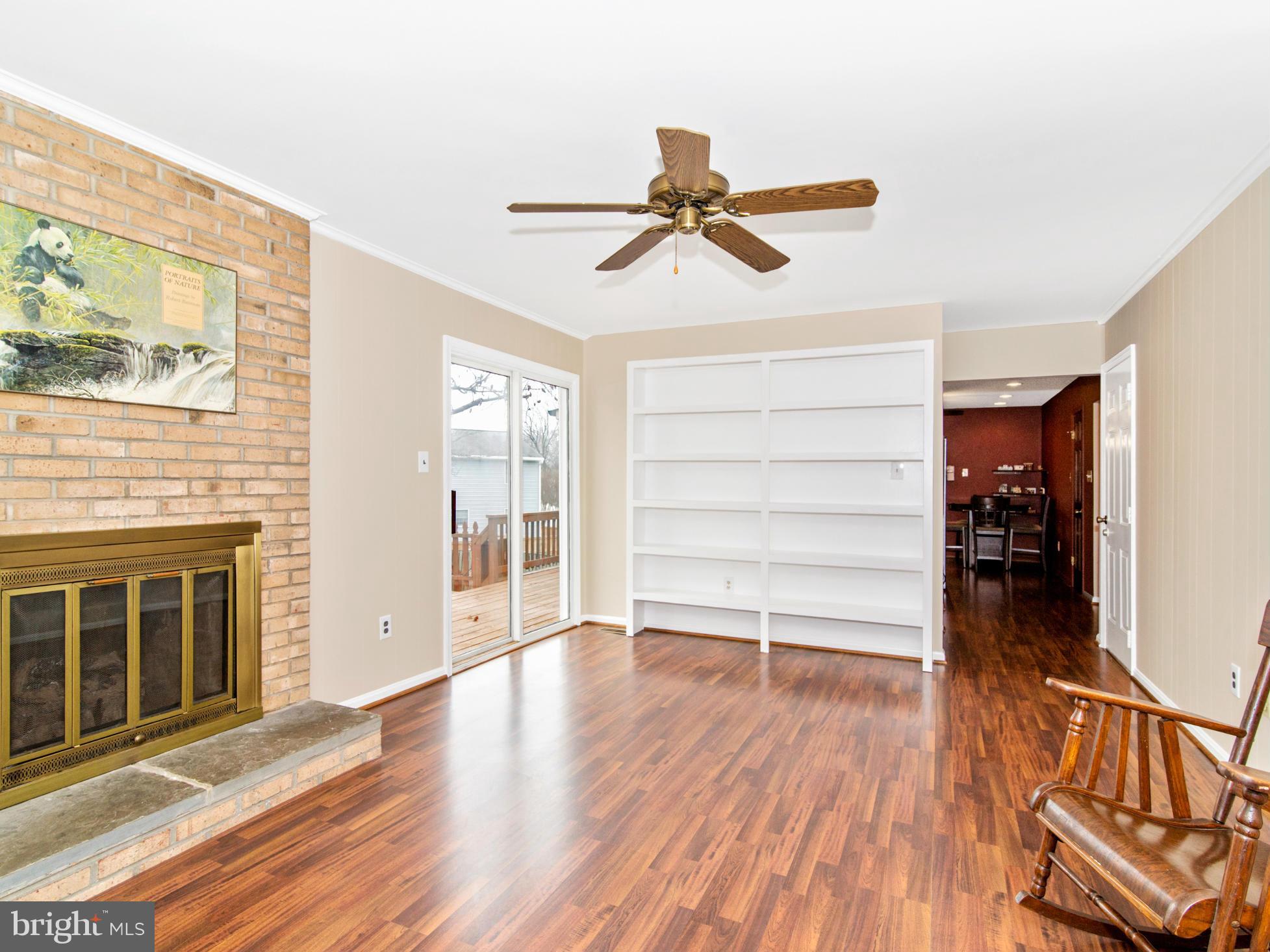 127 Summit Hall Road Gaithersburg, MD 20877 - Photo 16 of 30 a view of empty room with wooden floor and fan