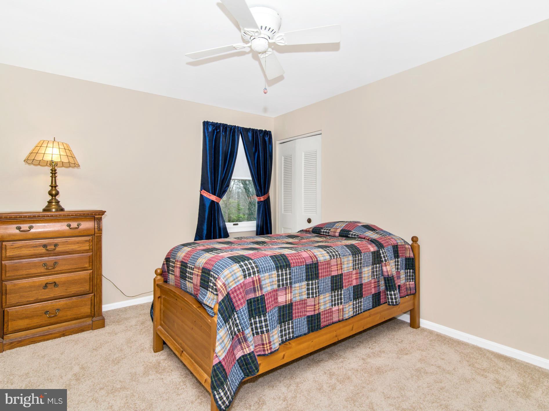127 Summit Hall Road Gaithersburg, MD 20877 - Photo 23 of 30 a bedroom with a bed and a window