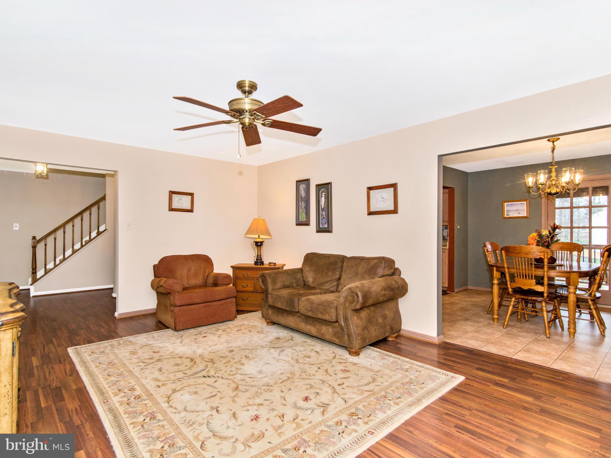 127 Summit Hall Road Gaithersburg, MD 20877 - Photo 5 of 30 a living room with furniture wooden floor and a table