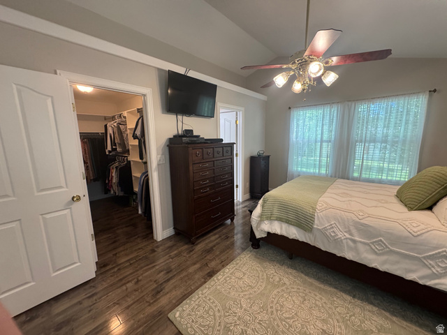 1976 River Bottom Road Springville, UT 84663 - Photo 20 of 45 Vaulted ceiling room featuring wood-finish flooring, a ceiling fan with integrated lighting, and multiple windows with sheer coverings